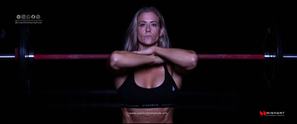 Woman performing weight training workout for muscle building
