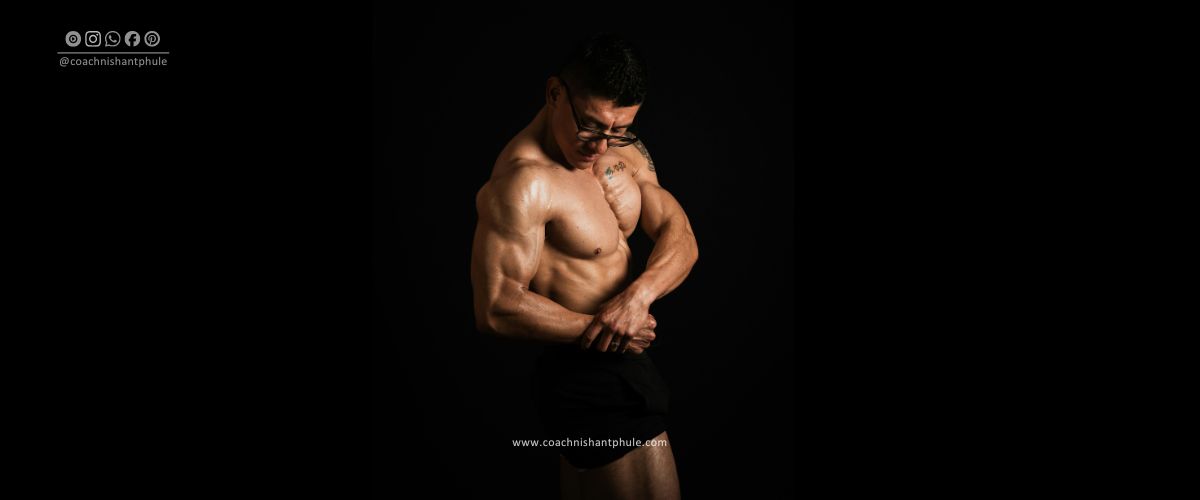 Muscular male bodybuilder posing for advanced bodybuilding workout plan